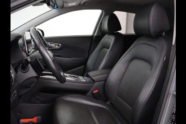 Hyundai Kona EV Premium 64 kWh | SOH 100% | 3 Fase | Stoelventilatie | Head-Up | Leder | Adaptive cruise | Carplay | Stoelverwarming | Navigatie | Keyless | Climate control