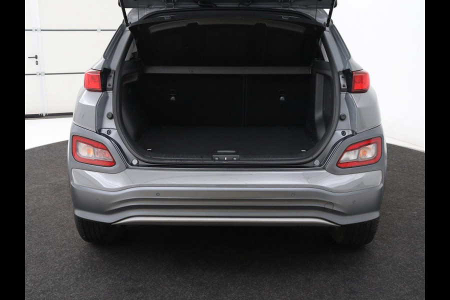 Hyundai Kona EV Premium 64 kWh | SOH 100% | 3 Fase | Stoelventilatie | Head-Up | Leder | Adaptive cruise | Carplay | Stoelverwarming | Navigatie | Keyless | Climate control