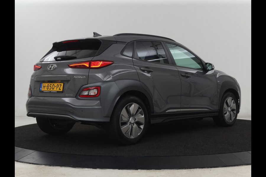 Hyundai Kona EV Premium 64 kWh | SOH 100% | 3 Fase | Stoelventilatie | Head-Up | Leder | Adaptive cruise | Carplay | Stoelverwarming | Navigatie | Keyless | Climate control
