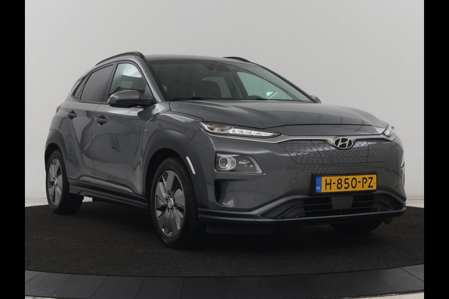 Hyundai Kona EV Premium 64 kWh | SOH 100% | 3 Fase | Stoelventilatie | Head-Up | Leder | Adaptive cruise | Carplay | Stoelverwarming | Navigatie | Keyless | Climate control