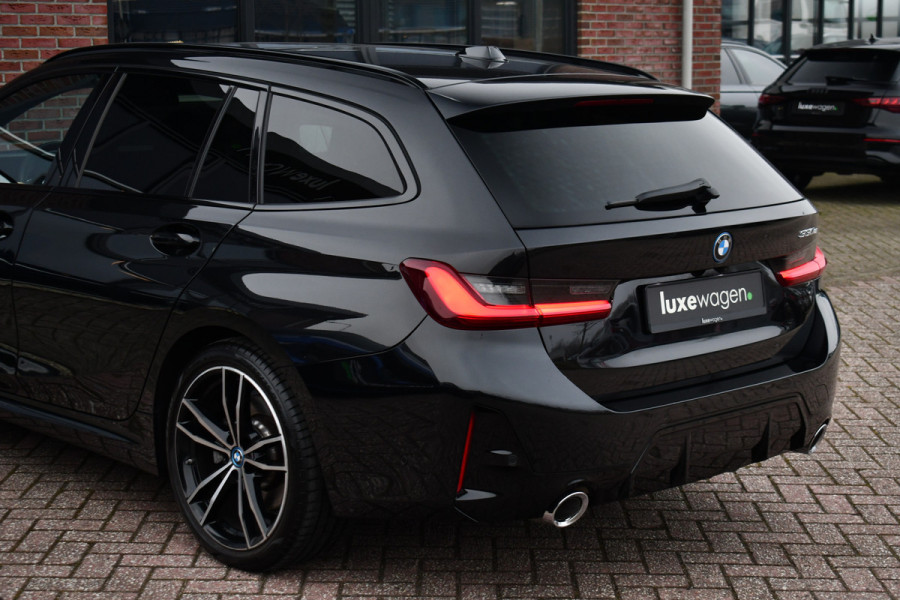 BMW 3 Serie Touring 330e M-Sport Pano ACC Trekh H/K HUD 19inch Stuurverw