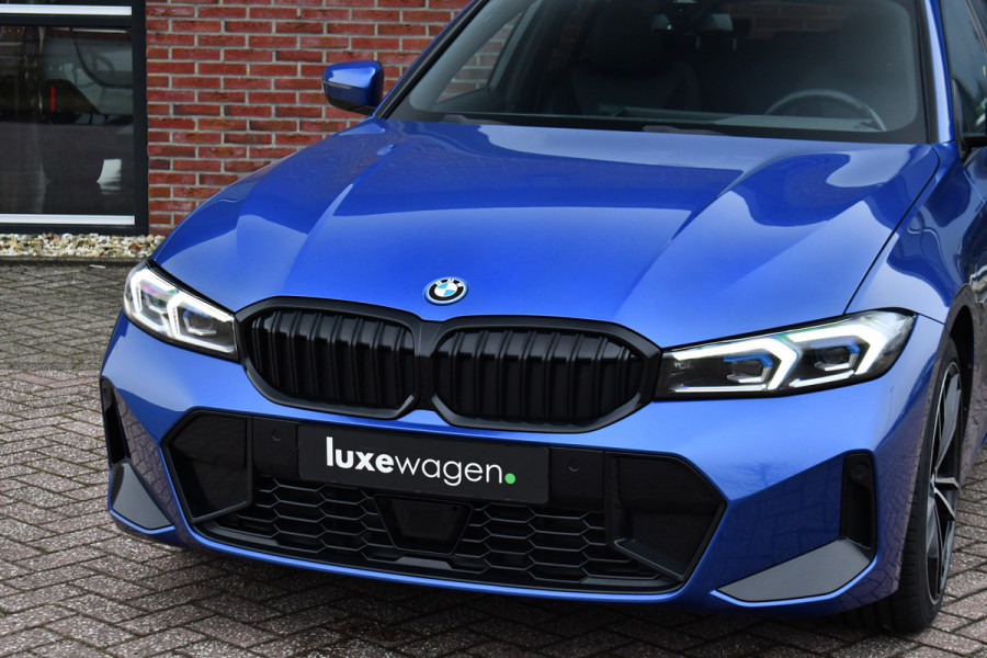 BMW 3 Serie Touring 330e M-Sport Pano ACC Trekhaak HiFi 19inch