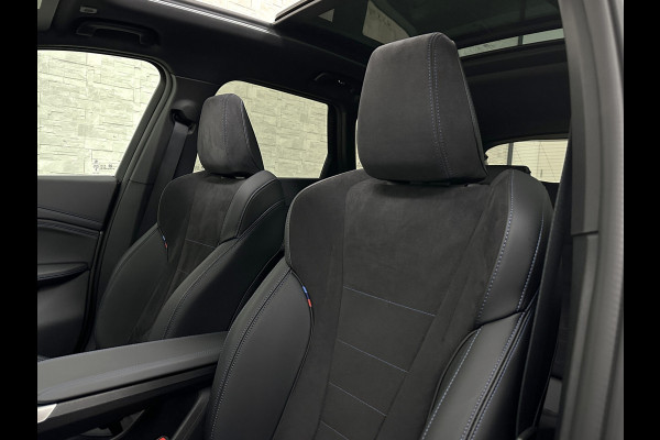 BMW X1 18i M-Sport Performance-Pack | Panorama | Sportstoelen | Carbon | Keyless-Entry | Sfeerverlichting | Achteruitrij-Camera | 5x op voorraad | Carplay | Full-LED | Black-Optic | Getint Glas | Stoelverwarming | Draadloos Laden |