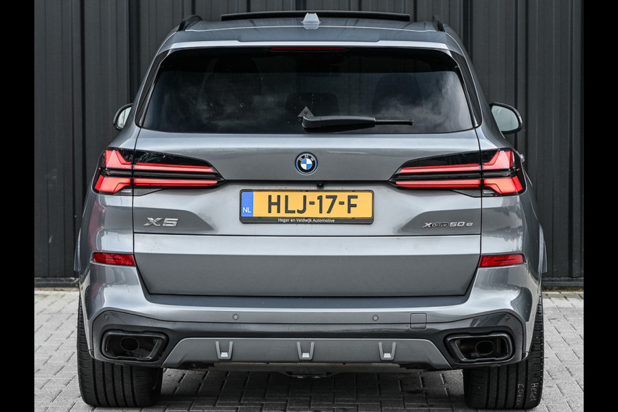 BMW X5 xDrive50e 490pk M Sport Pro | Panorama dak | Luchtvering | Comfort Access | Soft Close | Trekhaak | Shadowline Lights | Comfort Seats | 4-Zone Climate | Driving Assistant Prof. | Harman/Kardon | Ambient Ai