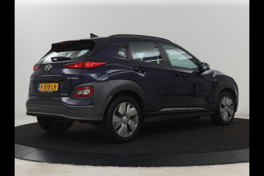 Hyundai Kona EV Comfort 64 kWh | SOH 100% | 3 Fase | Adaptive cruise | Krell Audio | Warmtepomp | Keyless | Camera | Carplay | Navigatie