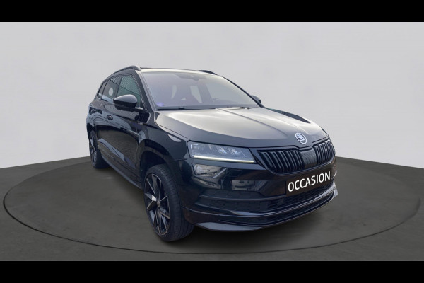 Škoda Karoq 1.5 TSI ACT 150pk DSG Sportline Business Panorama Trekhaak Camera Stoelverwarming Carplay