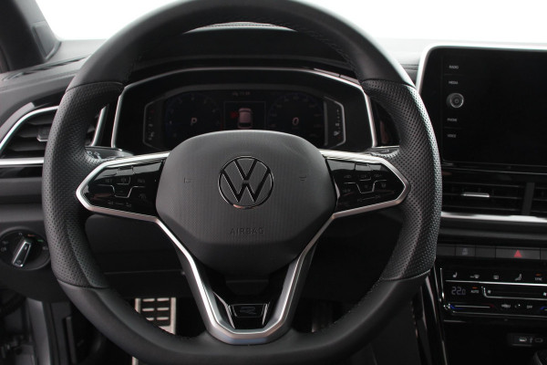 Volkswagen T-Roc 1.5 TSI 150pk DSG R-Line | Navigatie | Apple Carplay/Android Auto | Parkeersensoren | Camera | Blind Spot Assist | Adaptive Cruise Control | Elektrische achterklep | Stoel- en stuurverwarming | Climate Control | Ledverlichting | Virtual Cockpit