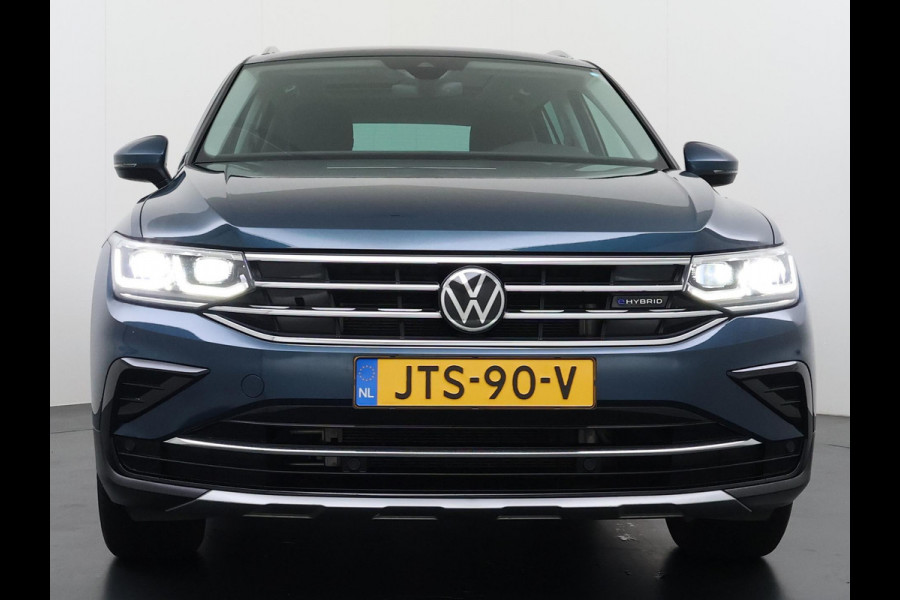 Volkswagen Tiguan 1.4 TSI eHybrid PHEV VAN €33.900,- NU VOOR SLECHTS €30.877,- Uw LENTEVOORDEEL €3.023,- |SUPER COMPLEET| SCHUIF/ KANTELDAK| DODE HOEK| ELEK. ACHTERKLEP| DIG. DASH | CAMERA| RIJKLAAR GELEVERD INCL. 12 MND BOVAG GARANTIE