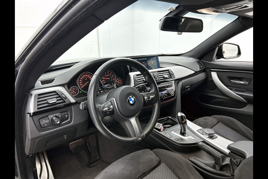 BMW 4 Serie Gran Coupé 418i High Executive (PANORAMADAK, STOELVERWARMING, CARPLAY, DEALER ONDERHOUDEN, GROOT NAVI, SPORTSTOELEN)