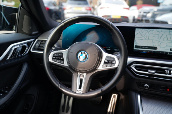 BMW i4 M50 High Executive 84 kWh | Schuifdak | BTW incl. | Harman/Kardon | Head up | Adaptieve cruise | Kuipstoelen | 360 cam |