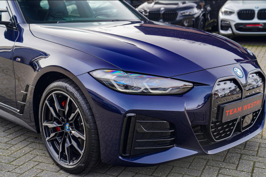 BMW i4 M50 High Executive 84 kWh | Schuifdak | BTW incl. | Harman/Kardon | Head up | Adaptieve cruise | Kuipstoelen | 360 cam |