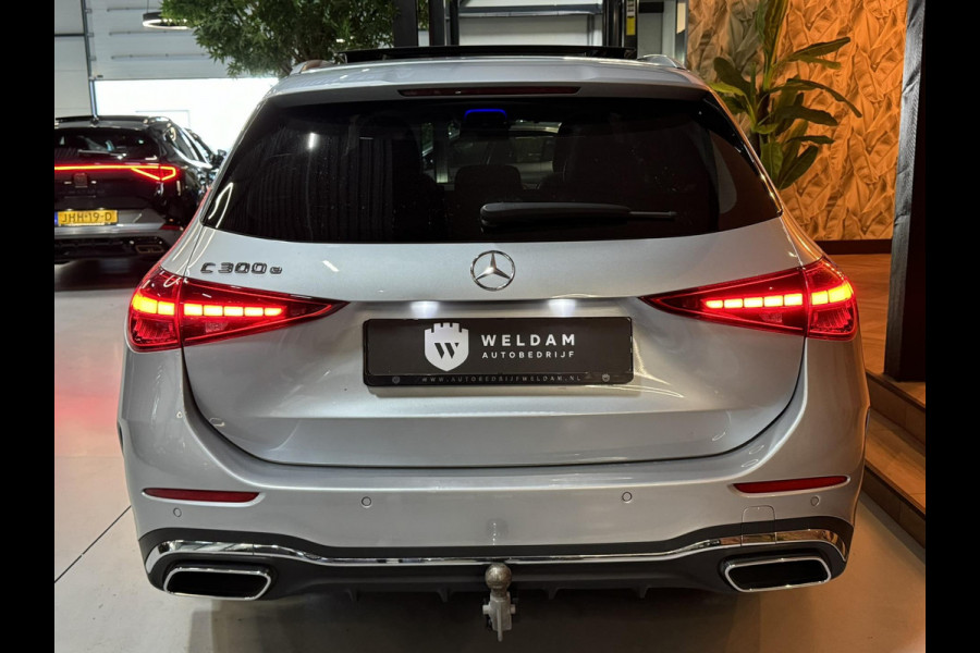 Mercedes-Benz C-Klasse Estate 300 e AMG Line Garantie Trekhaak Massage Pano Ambient 360 Blindspot Elek Achterklep StuurVW Rijklaar