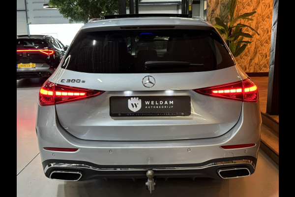 Mercedes-Benz C-Klasse Estate 300 e AMG Line Garantie Trekhaak Massage Pano Ambient 360 Blindspot Elek Achterklep StuurVW Rijklaar