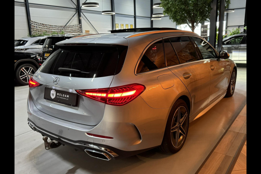 Mercedes-Benz C-Klasse Estate 300 e AMG Line Garantie Trekhaak Massage Pano Ambient 360 Blindspot Elek Achterklep StuurVW Rijklaar
