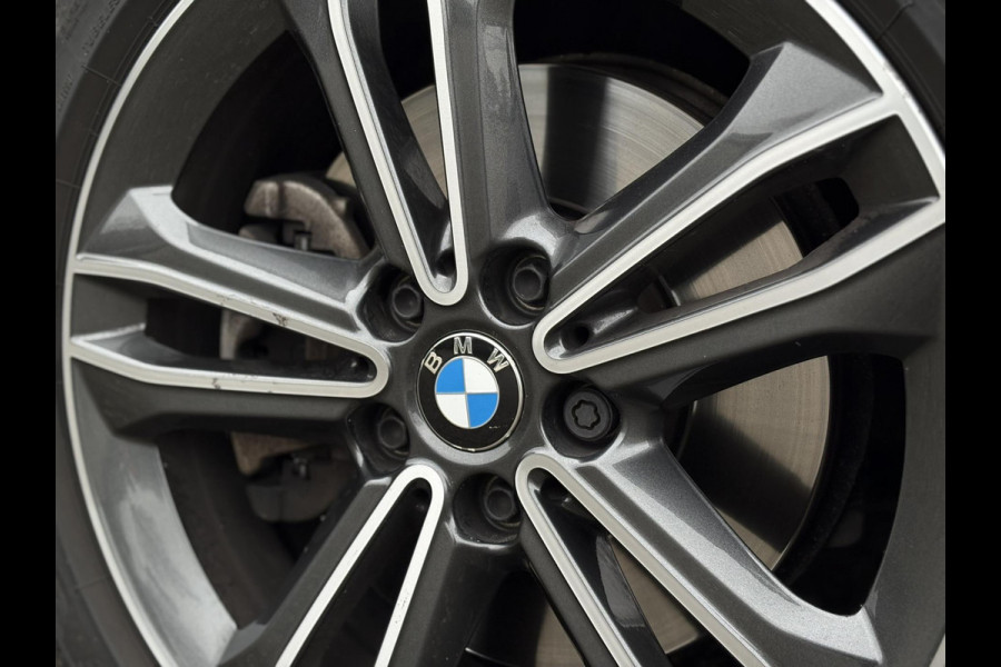 BMW 1-serie 118i High Executive Edition | Navi, PDC, Carplay/Android, Cruise, Stoelverw., Climate | Goed onderhouden |