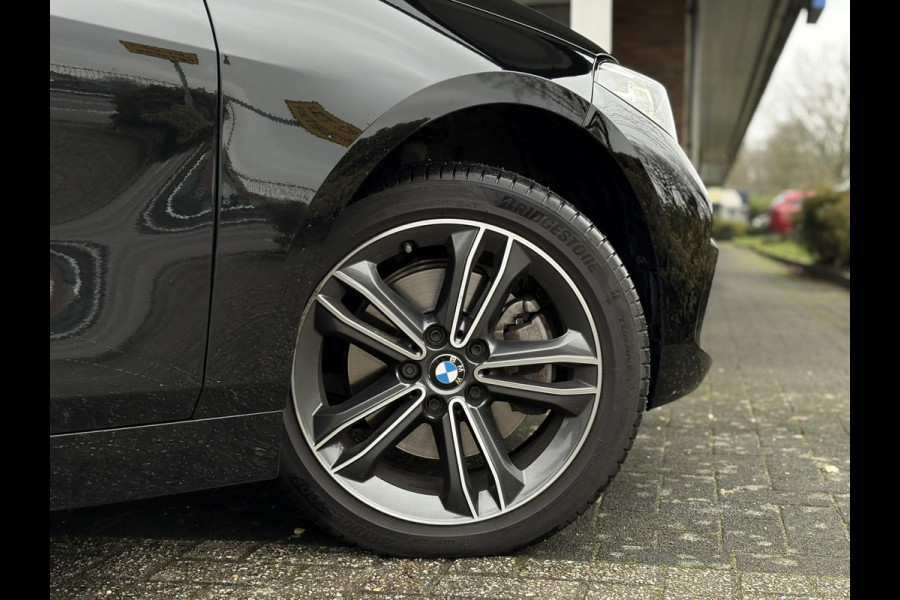 BMW 1-serie 118i High Executive Edition | Navi, PDC, Carplay/Android, Cruise, Stoelverw., Climate | Goed onderhouden |