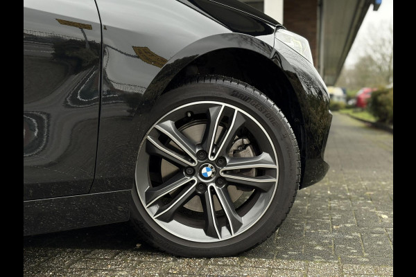 BMW 1-serie 118i High Executive Edition | Navi, PDC, Carplay/Android, Cruise, Stoelverw., Climate | Goed onderhouden |