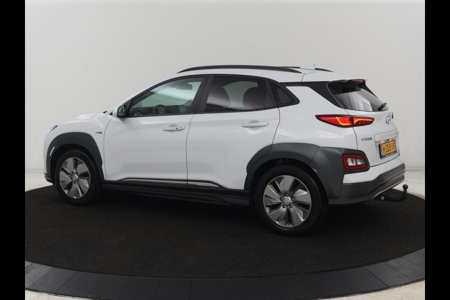 Hyundai Kona EV Premium 64 kWh | SOH 100% | 3 Fase | Stoelventilatie | Leder | Head-Up | Warmtepomp | Trekhaak | Achterbankverwarming | Adaptive cruise | Camera | Carplay | Full LED