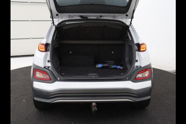 Hyundai Kona EV Premium 64 kWh | SOH 100% | 3 Fase | Stoelventilatie | Leder | Head-Up | Warmtepomp | Trekhaak | Achterbankverwarming | Adaptive cruise | Camera | Carplay | Full LED