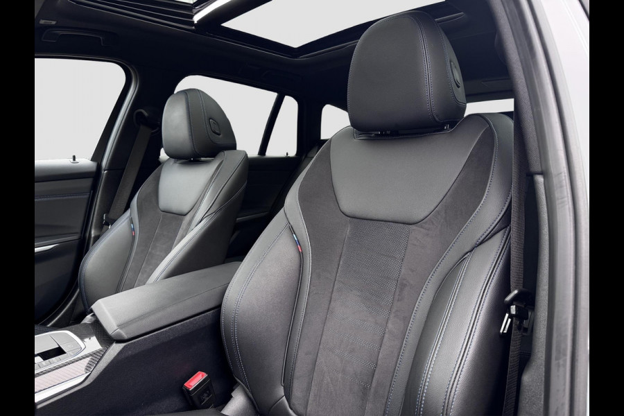 BMW 3 Serie Touring 320e | M-Sport | Pano | Harman Kardon | 19 inch | Carbon | Stuurwiel verwarmd | Individual | Brooklyn Grey