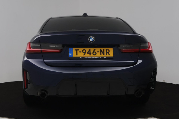 BMW 3 Serie 318i (STOELVERWARMING, STUURVERWARMING, ACHTERUITRIJCAMERA, PARKEERSENSOREN, NAVIGATIE)