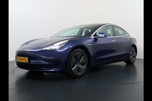 Tesla Model 3 RWD SR plus 325PK SOH 93% LFP Accu AutoPilot Leder Panoramadak Adaptive-Cruise Camera's Elektr.-Stuur+Stoelen+Spiegels+Geheugen+ Navi LED DAB Voorverwarmen Keyless One-Pedal-Drive Lmv 18" 1e Eigenaar Origineel Nederlandse Auto