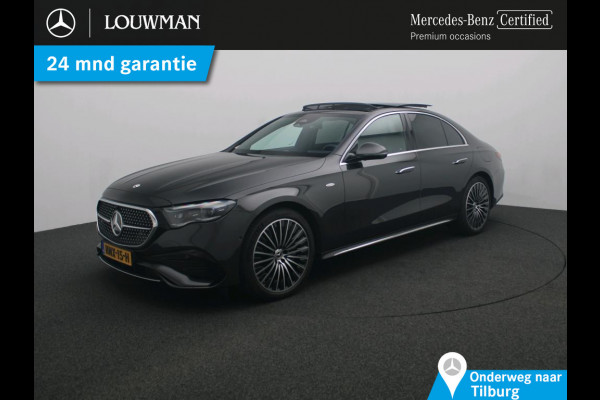 Mercedes-Benz E-Klasse 300 e Sport Edition AMG Line | Panorama Schuif-Kanteldak | Distronic | Lederen bekleding | Alarm | Parkeerpakket met 360°-camera | 20 Inch AMG Velgen. Inclusief 24 maanden MB Certified garantie voor Europa.