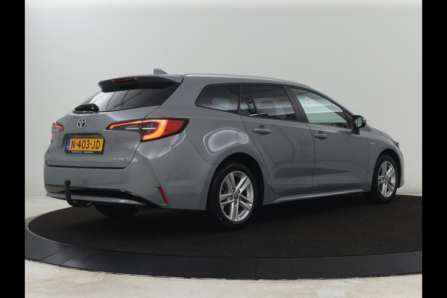 Toyota Corolla 1.8 Hybrid Business | Trekhaak | Camera | Adaptive cruise | Carplay | Full LED | Climate control | Bluetooth | DAB | Getint glas