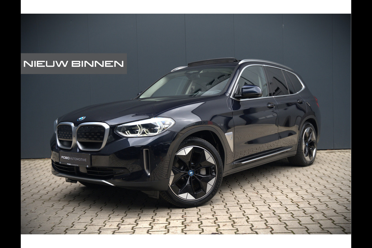 BMW iX3 High Executive 80 kWh | Panoramadak | Keyless | Stoelverwarming | Harman Kardon | Memory Seat | Head-Up Display | 360 Camera | Adaptief Onderstel | Trekhaak | Adaptive LED | Elektrische Stoelen | Apple Carplay |