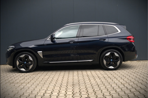 BMW iX3 High Executive 80 kWh | Panoramadak | Keyless | Stoelverwarming | Harman Kardon | Memory Seat | Head-Up Display | 360 Camera | Adaptief Onderstel | Trekhaak | Adaptive LED | Elektrische Stoelen | Apple Carplay |
