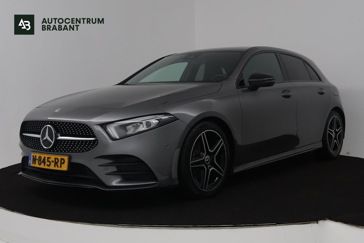 Mercedes-Benz A-Klasse 180 Business Solution AMG (SFEERVERLICHTING, ACHTERUITRIJCAMERA, STOELVERWARMING, NAVIGATIE, SENSOREN)