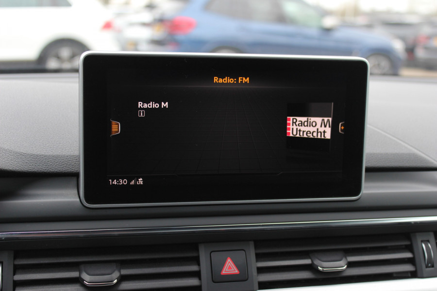 Audi A5 Cabriolet 2.0 TFSI Launch Edition / Trekhaak / Leder / Nekverwarming / Navigatie / Parkeerhulp V+A / 19'' / Windscherm / Stoelverwarming / Cruise Control