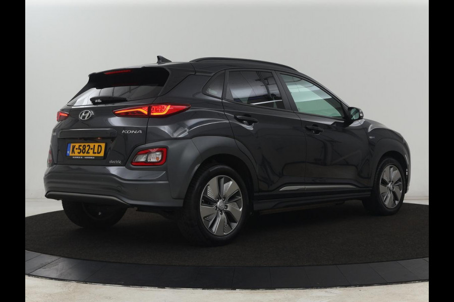 Hyundai Kona EV Limited 64 kWh | SOH 100% | 3 Fase | Stoelventilatie | Head-Up | Adaptive cruise | Camera | Leder | Carplay | Achterbankverwarming | Warmtepomp | Keyless | Full LED | Dodehoek detectie