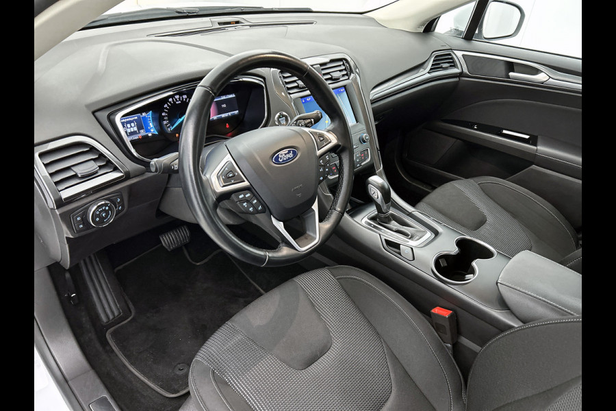 Ford Mondeo Wagon 2.0 Hybrid Titanium Automaat / Pdc.V+A / Navigatie / Radio-multimedia /  Airco-ecc. / Apk 12-2027