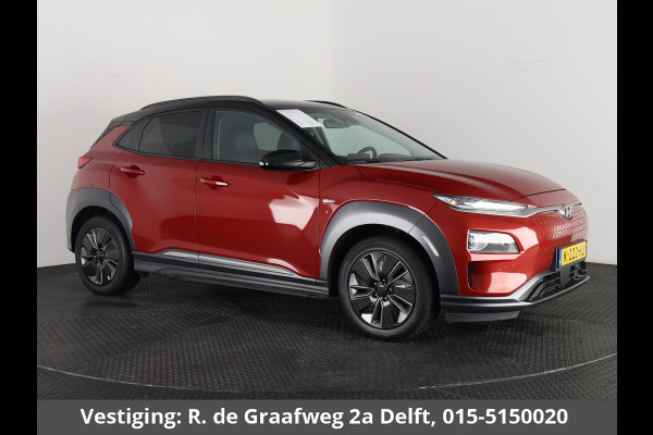 Hyundai Kona EV Premium Two-Tone 64 kWh SOH ACCU 99% | Apple Carplay/Android Auto | Stuur-& Stoelverwarming | Navigatie | Leder | Camera |
