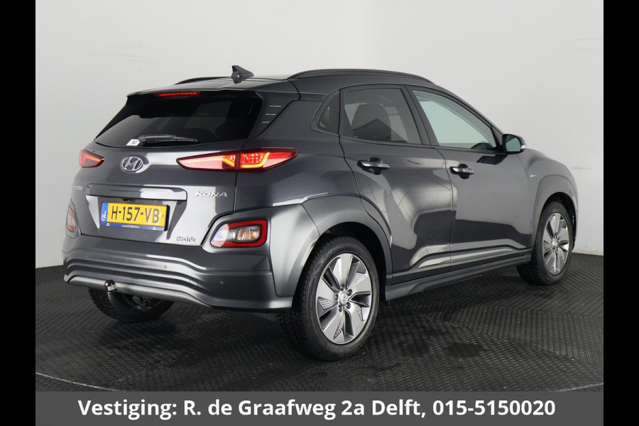 Hyundai Kona EV Premium 64 kWh | Schuif-Kanteldak | Stuur-& Stoelverwarming | Apple Carplay&AndroidAUTO | Leder | Camera |
