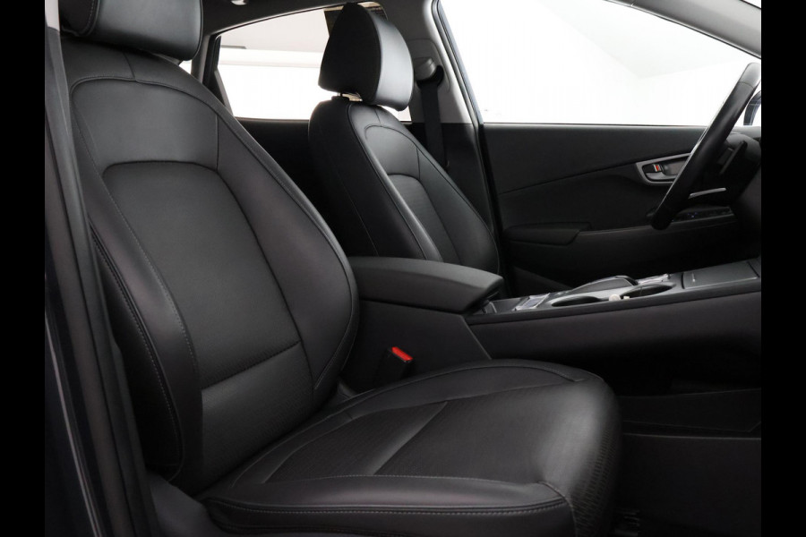 Hyundai Kona EV Premium 64 kWh | Schuif-Kanteldak | Stuur-& Stoelverwarming | Apple Carplay&AndroidAUTO | Leder | Camera |