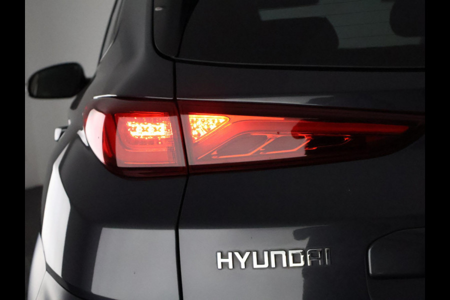 Hyundai Kona EV Premium 64 kWh | Schuif-Kanteldak | Stuur-& Stoelverwarming | Apple Carplay&AndroidAUTO | Leder | Camera |