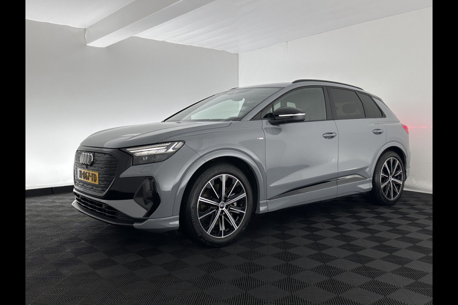 Audi Q4 e-tron 40 S-edition 77 kWh [ 3-Fase-11kW ] {SOH-89%} (INCL-BTW) *HEATPUMP | LEATHER-FABRIC | MATRIX-LED | ADAPTIVE-CRUISE | HEATED-SPORTSEATS | AMBIENTLIGHT | DIGI-COCKPIT | CAMERA | KEYLESS | DAB+ | NAVI-FULLMAP | TOWBAR | PRIVACYGLASS | 20"AL