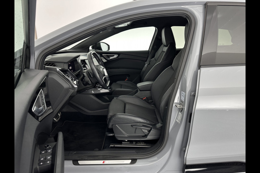 Audi Q4 e-tron 40 S-edition 77 kWh [ 3-Fase-11kW ] {SOH-89%} (INCL-BTW) *HEATPUMP | LEATHER-FABRIC | MATRIX-LED | ADAPTIVE-CRUISE | HEATED-SPORTSEATS | AMBIENTLIGHT | DIGI-COCKPIT | CAMERA | KEYLESS | DAB+ | NAVI-FULLMAP | TOWBAR | PRIVACYGLASS | 20"AL