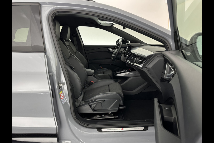Audi Q4 e-tron 40 S-edition 77 kWh [ 3-Fase-11kW ] {SOH-89%} (INCL-BTW) *HEATPUMP | LEATHER-FABRIC | MATRIX-LED | ADAPTIVE-CRUISE | HEATED-SPORTSEATS | AMBIENTLIGHT | DIGI-COCKPIT | CAMERA | KEYLESS | DAB+ | NAVI-FULLMAP | TOWBAR | PRIVACYGLASS | 20"AL