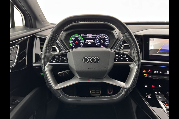 Audi Q4 e-tron 40 S-edition 77 kWh [ 3-Fase-11kW ] {SOH-89%} (INCL-BTW) *HEATPUMP | LEATHER-FABRIC | MATRIX-LED | ADAPTIVE-CRUISE | HEATED-SPORTSEATS | AMBIENTLIGHT | DIGI-COCKPIT | CAMERA | KEYLESS | DAB+ | NAVI-FULLMAP | TOWBAR | PRIVACYGLASS | 20"AL