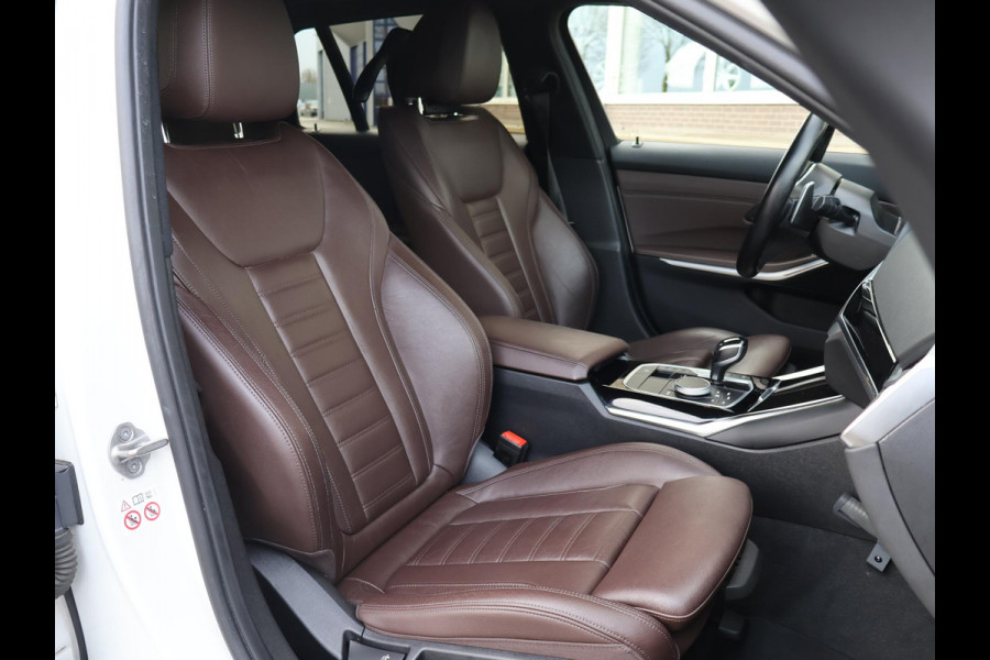 BMW 3 Serie Touring 320d HIGH EXECUTIVE SPORTLINE 190 PK AUT. *ALPINWEISS* + ELEK. TREKHAAK | LASER LED | 18 INCH | STOEL/STUURWIELVERW.