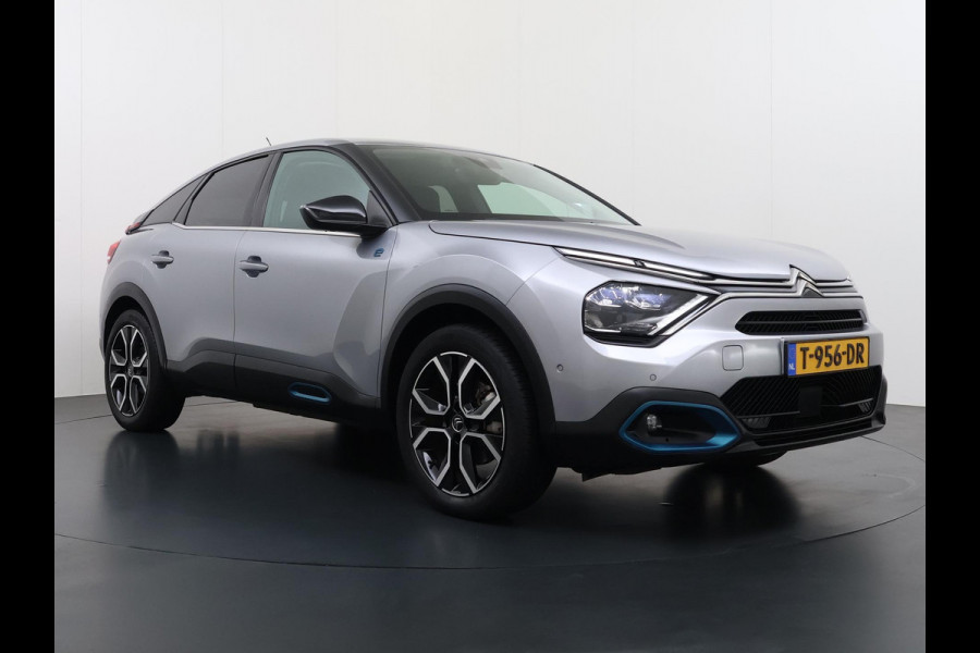 Citroën Ë-C4 Shine 50 kWh SOH 98% 3-FASE LADER | STUUR- & STOELVERWARMING | TREKHAAK | HEAD-UP DISPLAY | CAMERA | KEYLESS START & GO | DODEHOEKDETECTIE | RIJKLAAR MET 12 MAANDEN BOVAG-GARANTIE