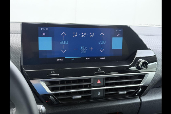Citroën Ë-C4 Shine 50 kWh SOH 98% 3-FASE LADER | STUUR- & STOELVERWARMING | TREKHAAK | HEAD-UP DISPLAY | CAMERA | KEYLESS START & GO | DODEHOEKDETECTIE | RIJKLAAR MET 12 MAANDEN BOVAG-GARANTIE