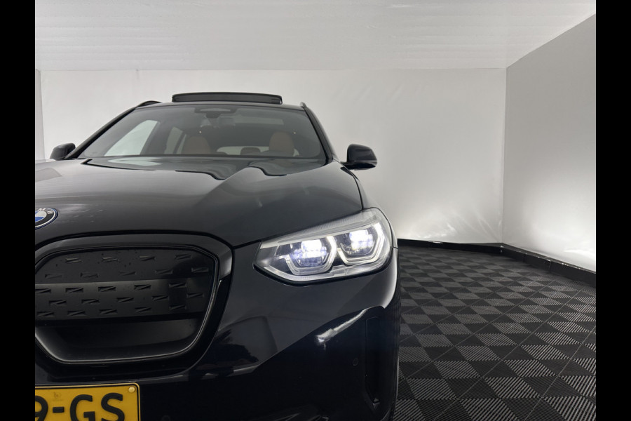BMW iX3 High Executive 80 kWh [ 3-Fase-11kW ] {SOH-96%} (INCL-BTW) Aut. *PANO | LEATHER | HARMAN/KARDON | FULL-LED | BLINDSPOT | MEMORY-PACK | DIGI-COCKPIT | HEATED-SPORTSEATS | KEYLESS | TOPVIEW | DAB+ | NAVI-FULLMAP | HEAD-UP | PRIVACY-GLASS |