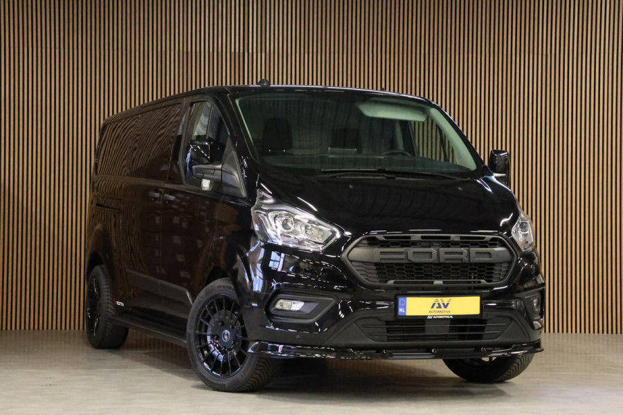 Ford Transit Custom 300 2.0 TDCI L2H1 Raptor Edition | CarPlay | Camera | Navigatie | Stoelverwarming | Trekhaak | 3-Zitter | DAB | PDC V+A | Nieuwe APK | NAP Logisch