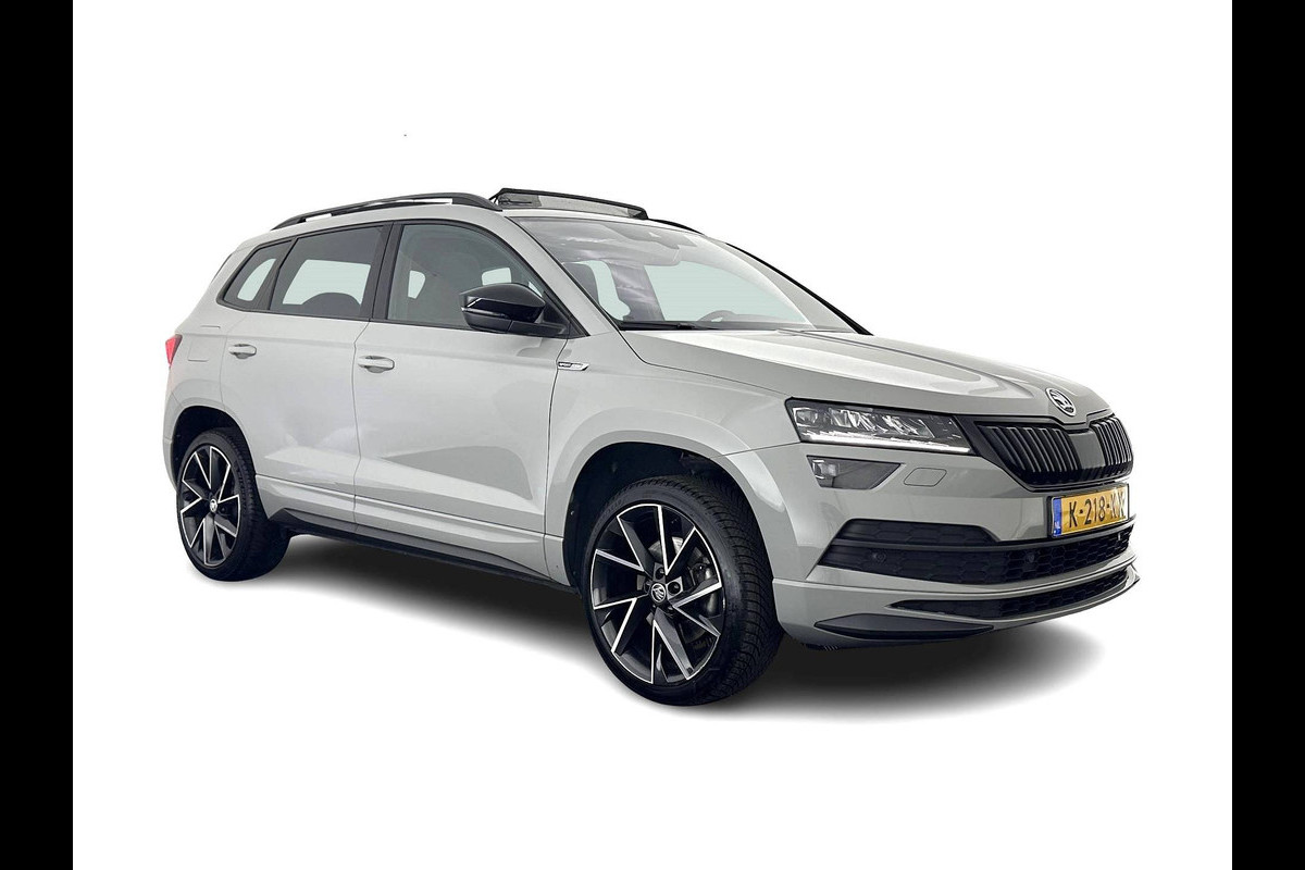 Škoda Karoq 1.5 TSI ACT Sportline Business (INCL-BTW) Aut. *PANO | DIGI-COCKPIT | FULL-LED | ADAPTIVE-CRUISE | CANTON-AUDIO | BLINDSPOT | HEATED-SPORTSEATS | CAMERA | AMBIENTLIGHT | NAVI-FULLMAP | KEYLESS | DAB+ | TOWBAR | PRIVACYGLAS