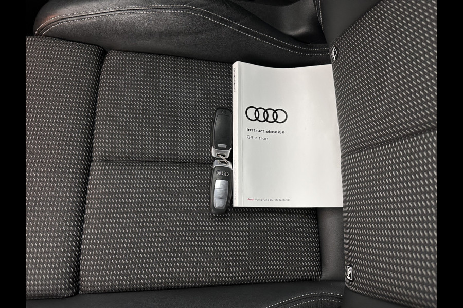 Audi Q4 e-tron 40 S-edition 77 kWh [ 3-Fase-11kW ] {SOH-89%} (INCL-BTW) *HEATPUMP | LEATHER-FABRIC | MATRIX-LED | ADAPTIVE-CRUISE | HEATED-SPORTSEATS | AMBIENTLIGHT | DIGI-COCKPIT | CAMERA | KEYLESS | DAB+ | NAVI-FULLMAP | TOWBAR | PRIVACYGLASS | 20"AL