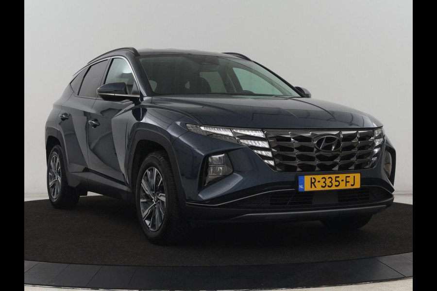 Hyundai Tucson 1.6 T-GDI HEV Comfort Smart | Trekhaak | Stoel & stuurverwarming | Adaptive cruise | Carplay | Camera | Navigatie | Keyless